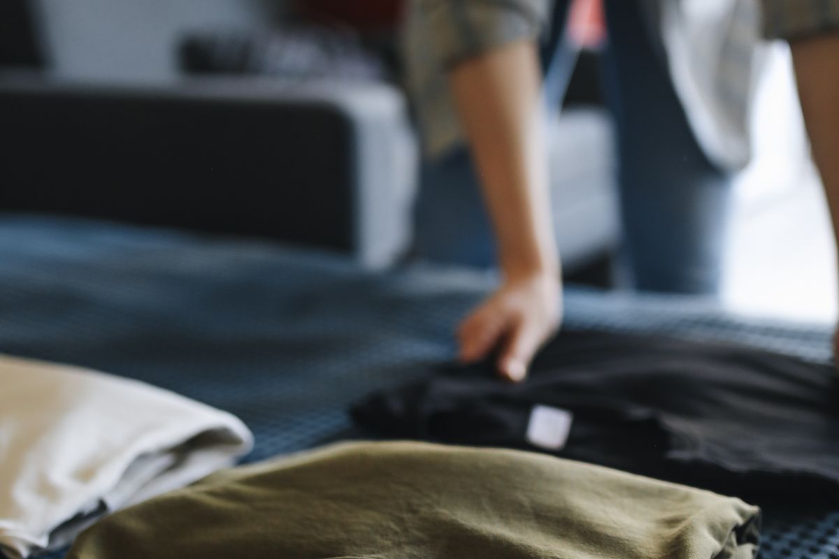 Folded crew-neck T-shirts laid out flat