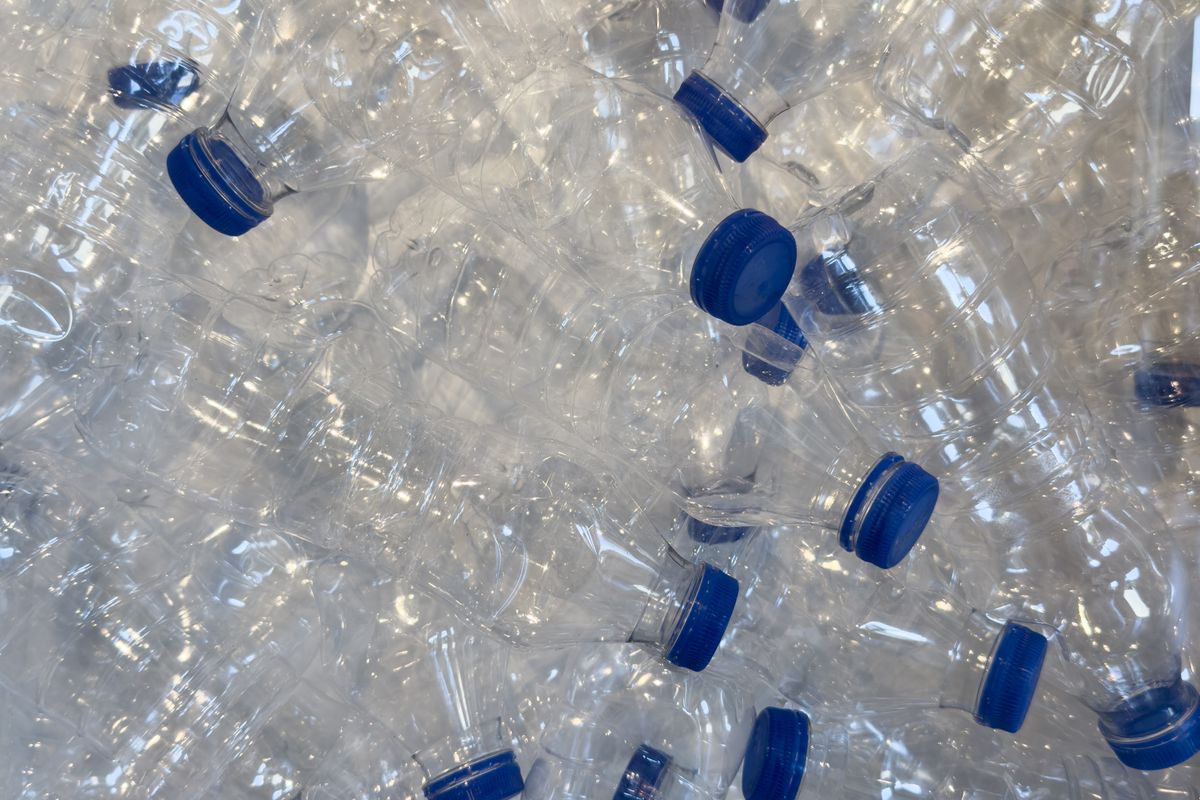 A pile of empty plastic bottles for recycling